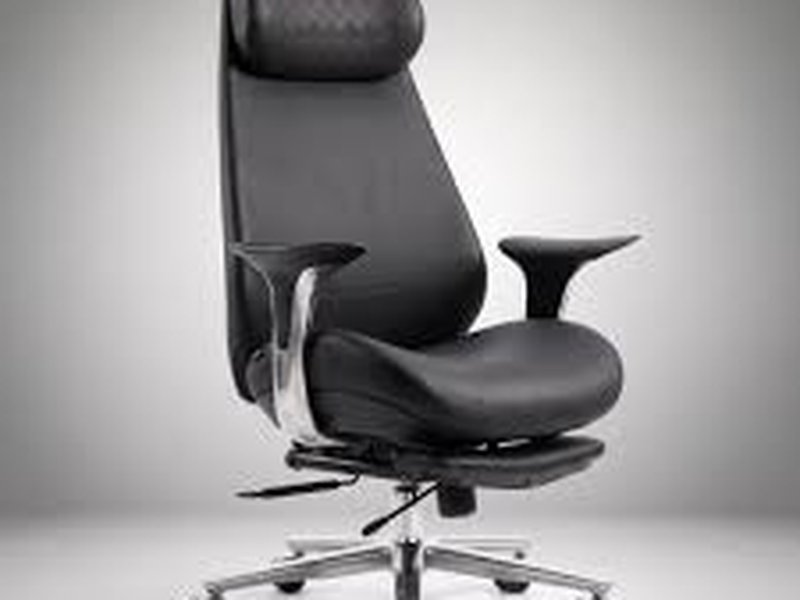 Black leather executive recliner chair with footrest